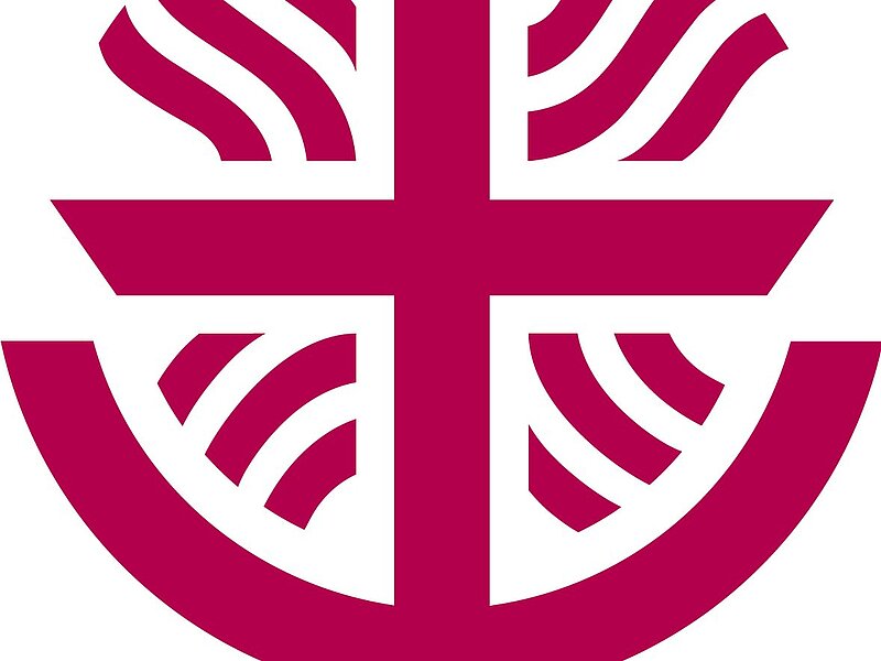 Magentafarbiges Logo: stilisierter Kreuzarm über halbkreisförmigem Boot mit wellenförmigen Linien, darunter der Schriftzug "SkF".