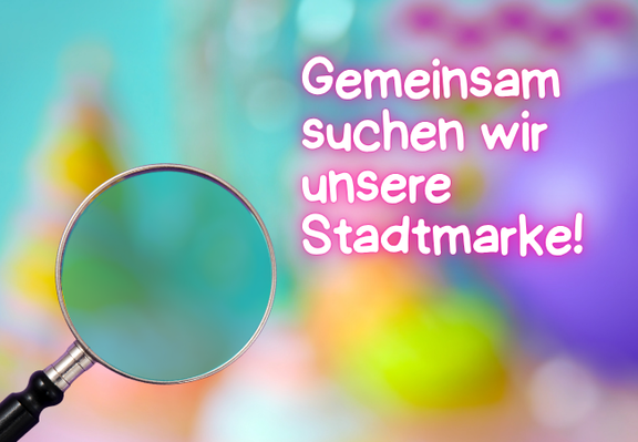 Lupe im Vordergrund neben der Aufschrift „Gemeinsam suchen wir unsere Stadtmarke!“, symbolisch für die gemeinsame Suche nach einer neuen Stadtmarke.